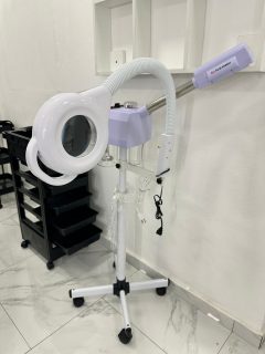 Vaporizador facial con lupa